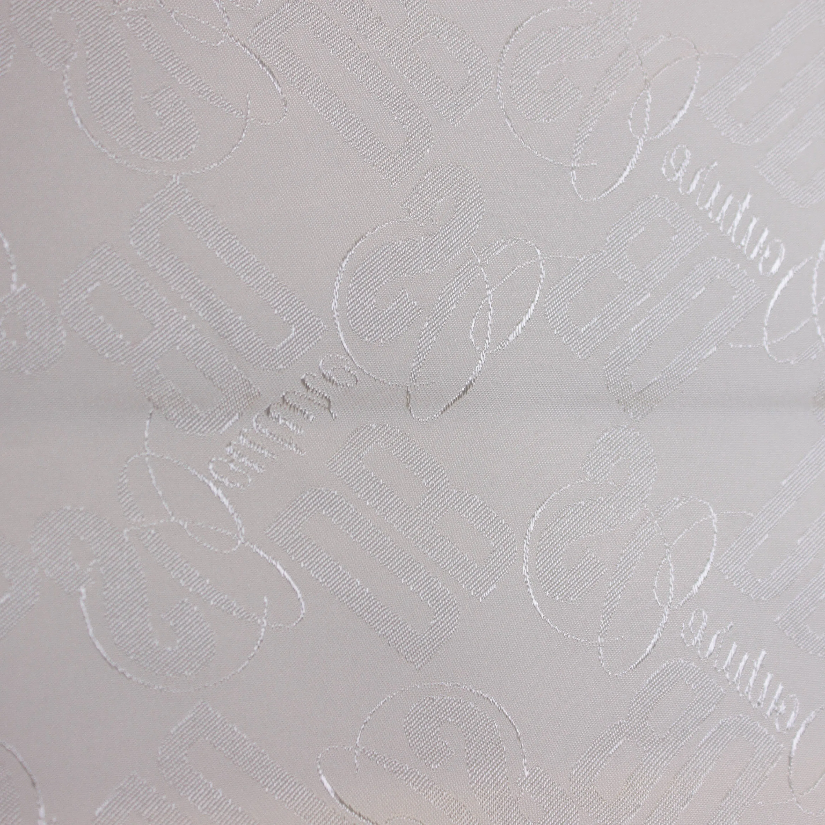 Fantasievoering ecru met DB couture logo